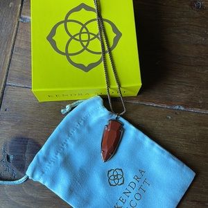 Kendra Scott orange, and rose gold arrowhead necklace